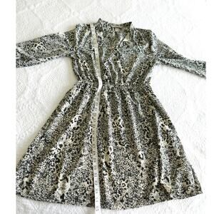 Snakeskin Print dress with bow neckline or open v Size 8